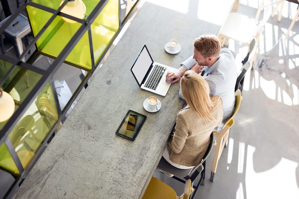 Young,Businesswoman,And,Man,Having,A,Conversation